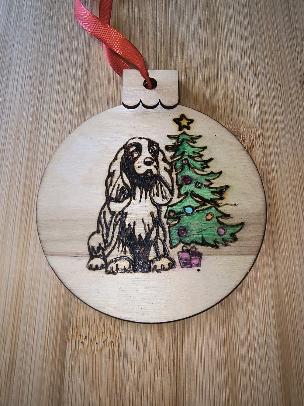 Hand Crafted Wooden Dog Ornament with Green Tree and Red Ribbon